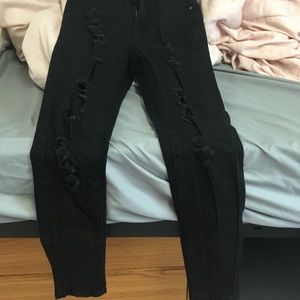 High-waisted black ripped jeans NEVER WORN